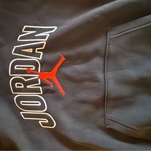 Jordan Black Garment with Red Logo